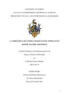 A complementary energy-based system approach to seismic hazard assessment