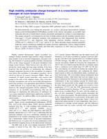 High Mobility Ambipolar Charge Transport in a Cross-Linked Reactive Mesogen at Room Temperature