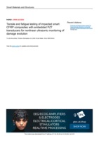 Tensile and fatigue testing of impacted smart CFRP composites with embedded PZT transducers for nonlinear ultrasonic monitoring of damage evolution